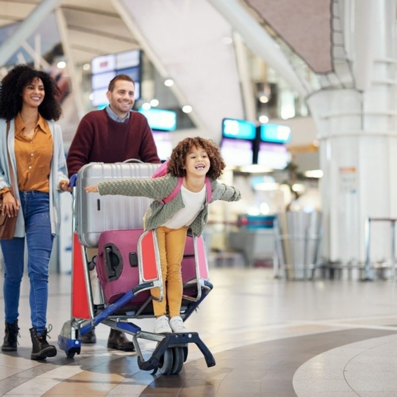 stock-photo-airport-family-and-child-excited-for-flight-with-suitcase-trolley-on-holiday-vacation-or-2267402745-transformed